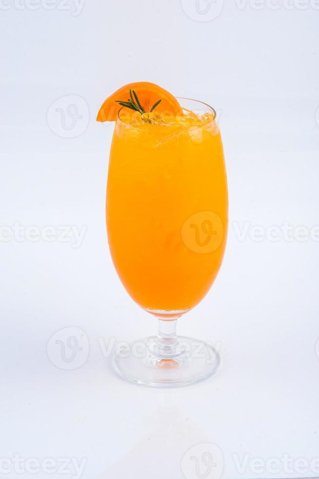 A smoothie orange juice. Beverage for summer on the white background. photo