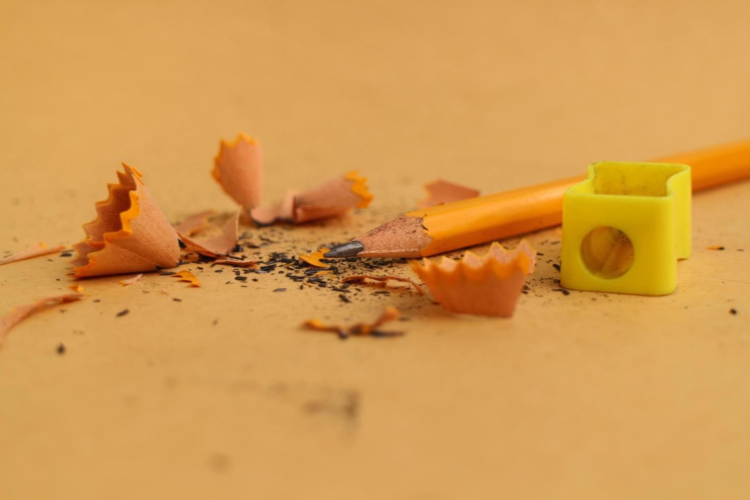 Pencil Sharpener on Wooden Background photo