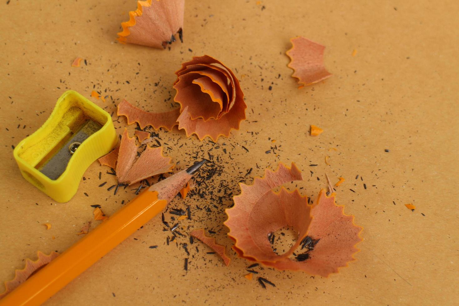 Pencil Sharpener on Wooden Background photo