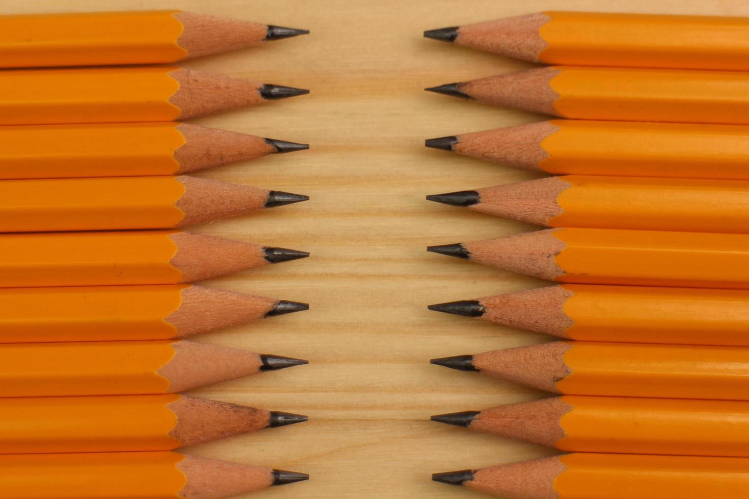 Yellow Pencil on Wooden Background photo