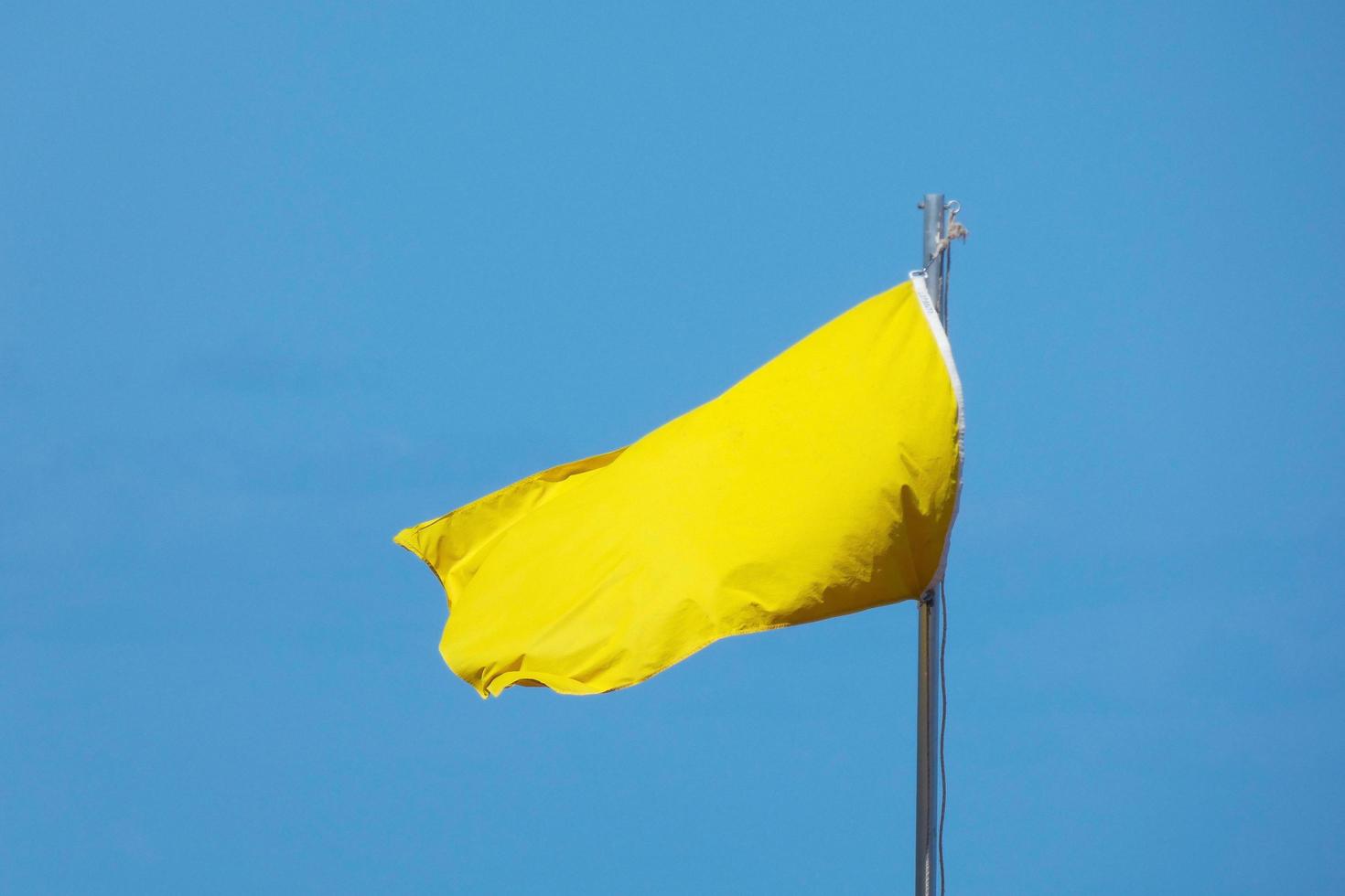 Coloured flags indicating danger and safety photo