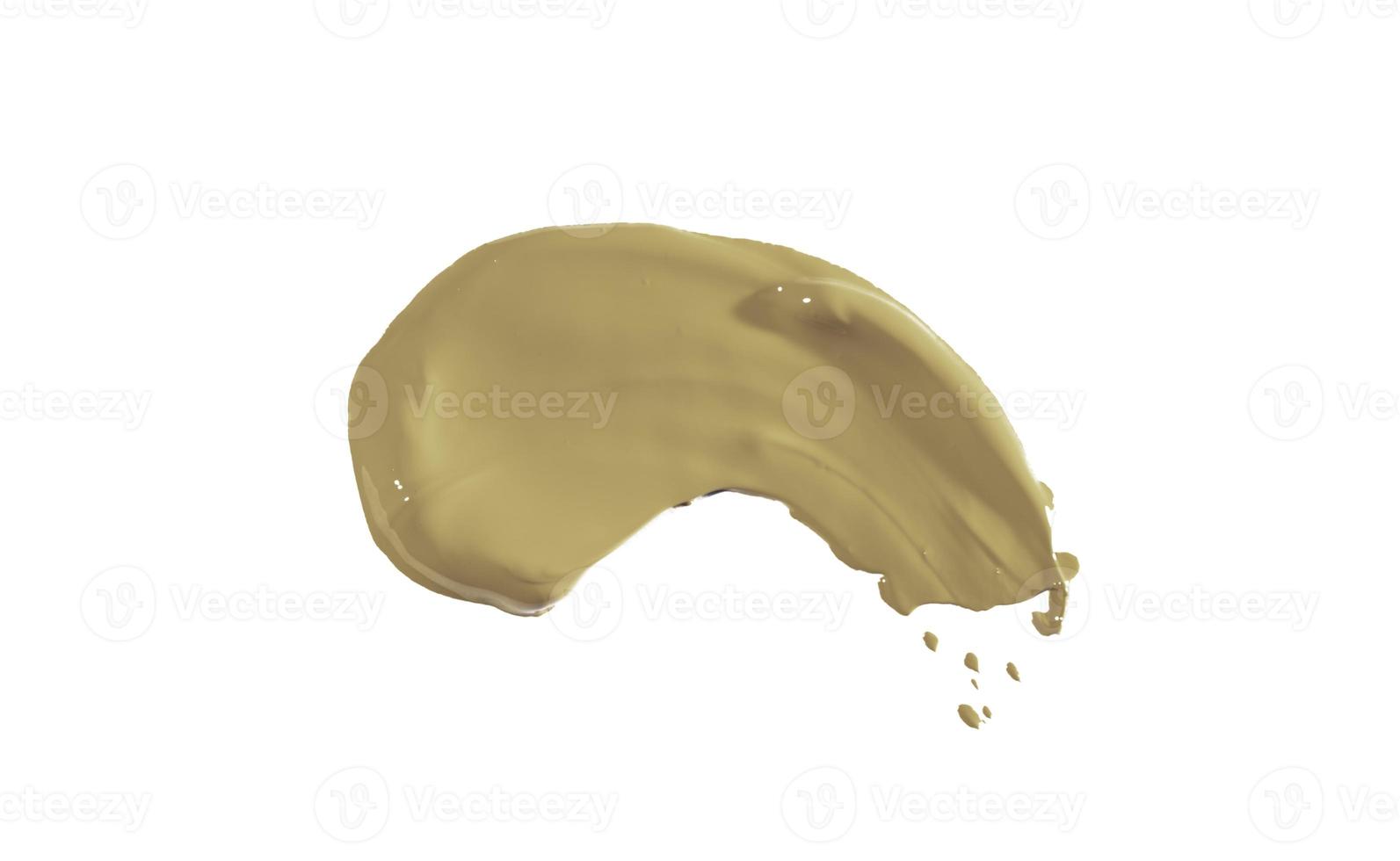 Correcting smear of concealer, isolated on a white background. photo