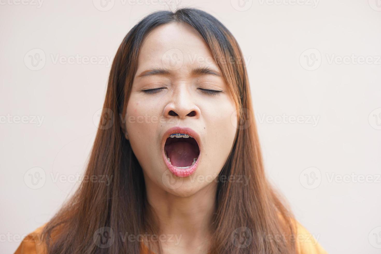 Asian woman having sleepiness from insufficient rest photo