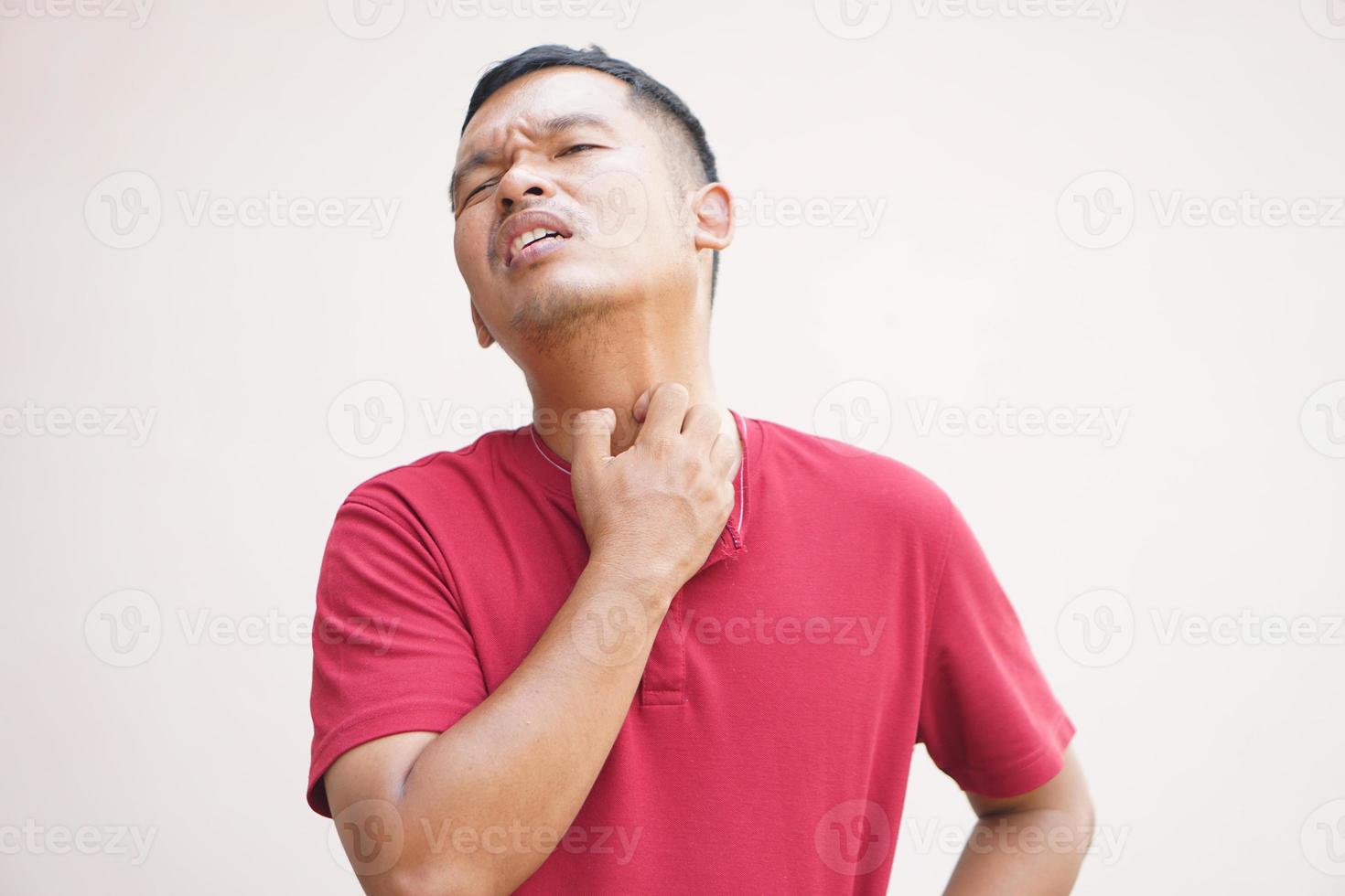 Asian men have an itchy neck photo