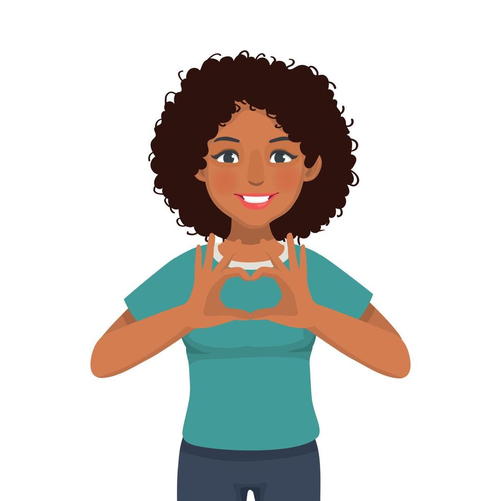 happy young African woman showing heart shape sign with hands gesture vector