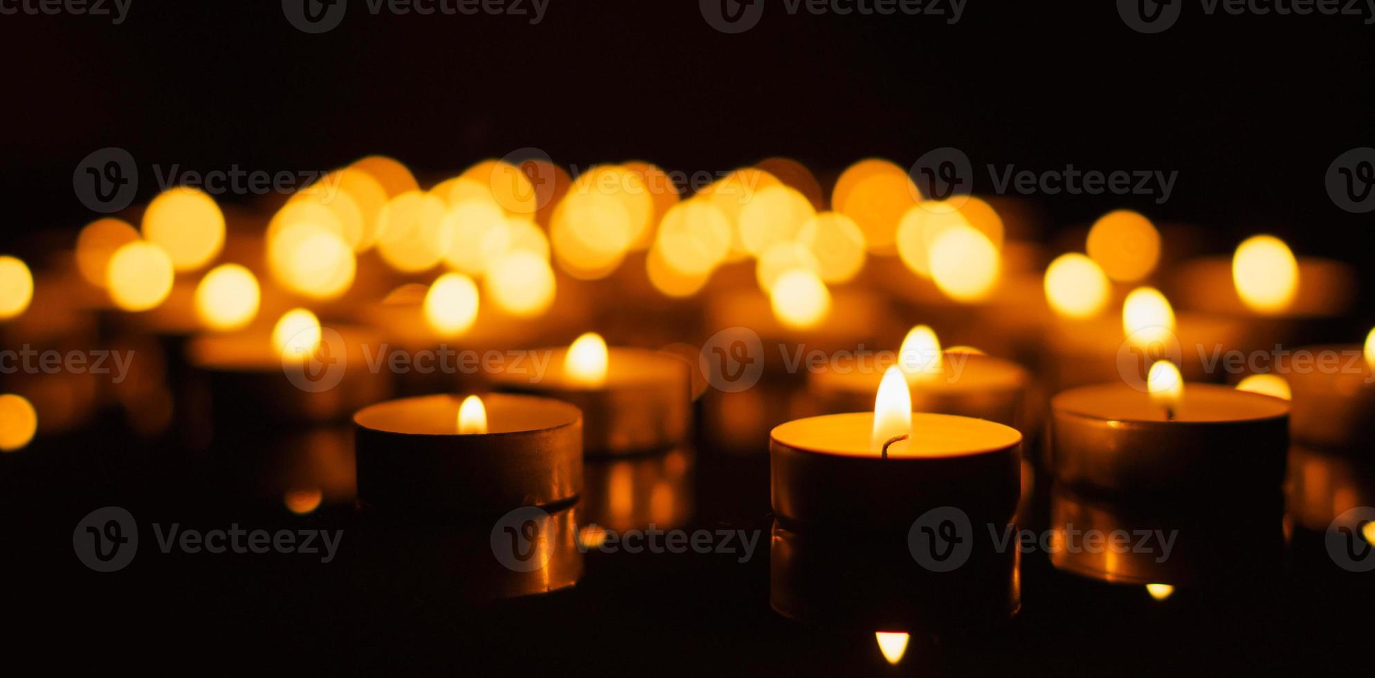 Burning candles with shallow depth of field photo
