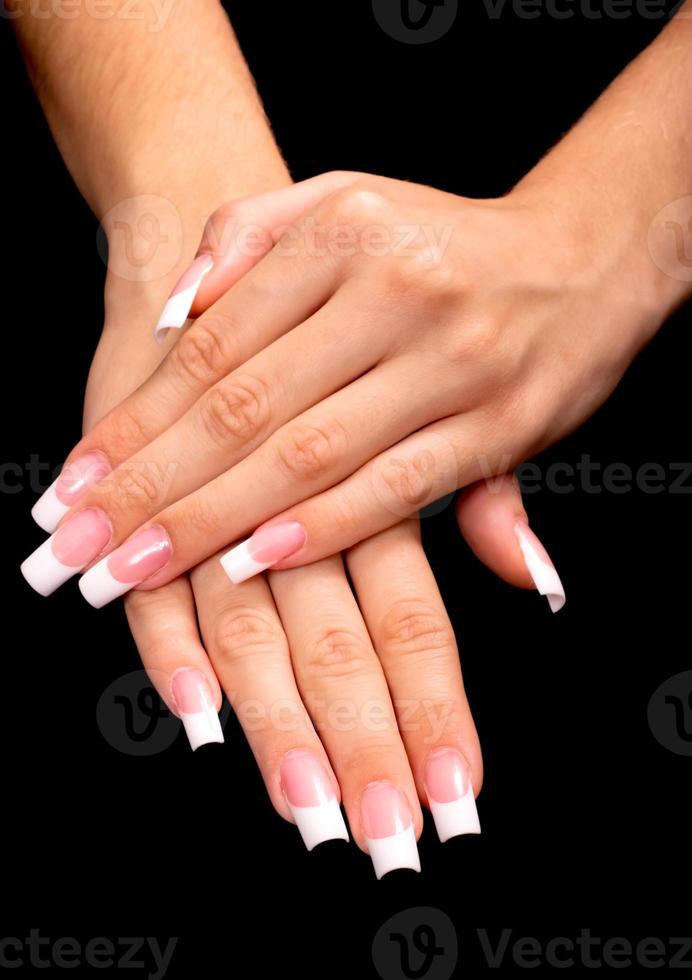 French manicure on Black background photo