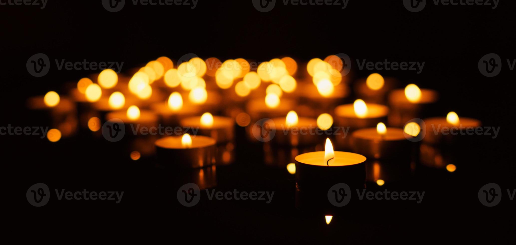 Burning candles with shallow depth of field photo