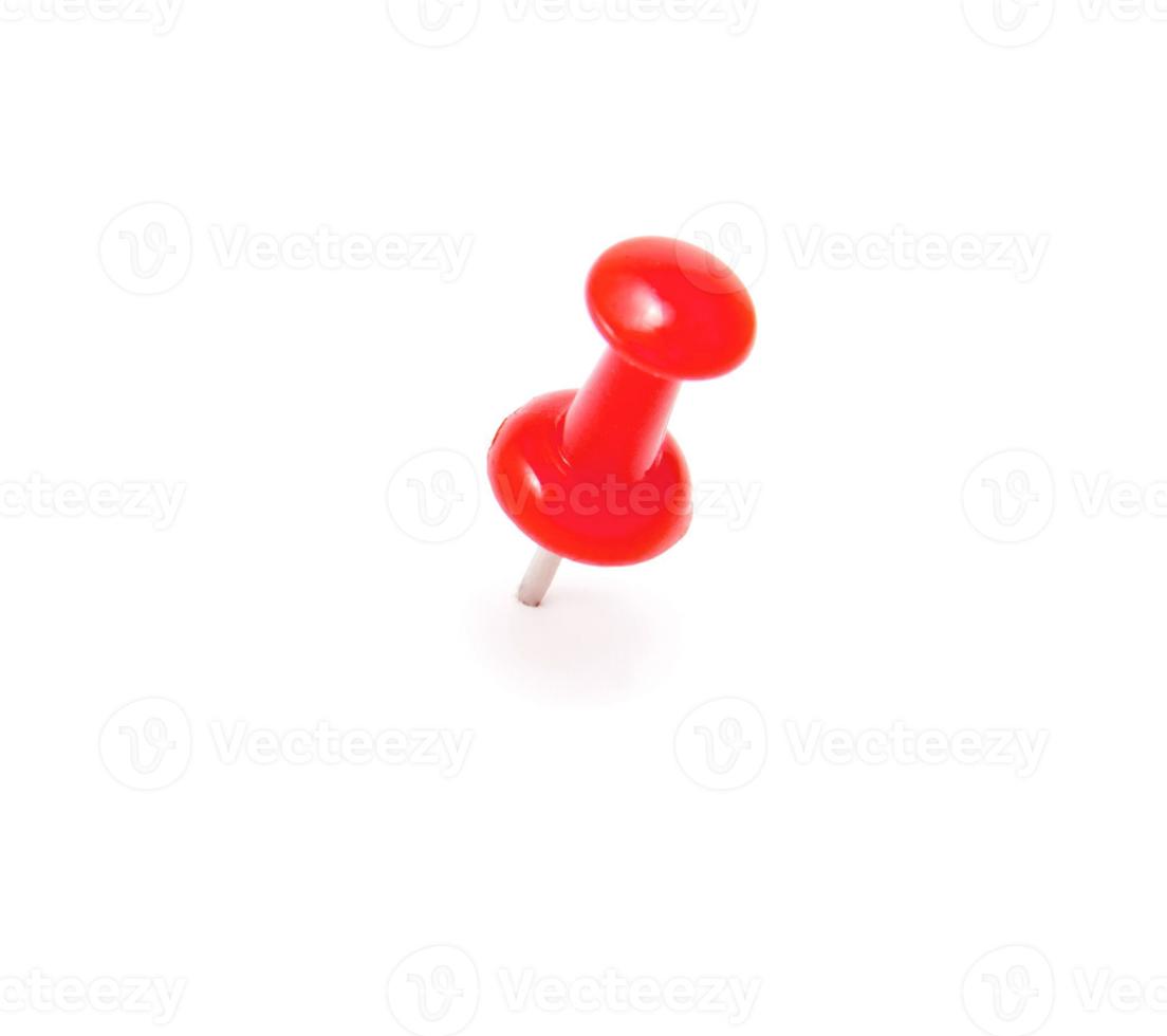 Red Push pin on white background photo