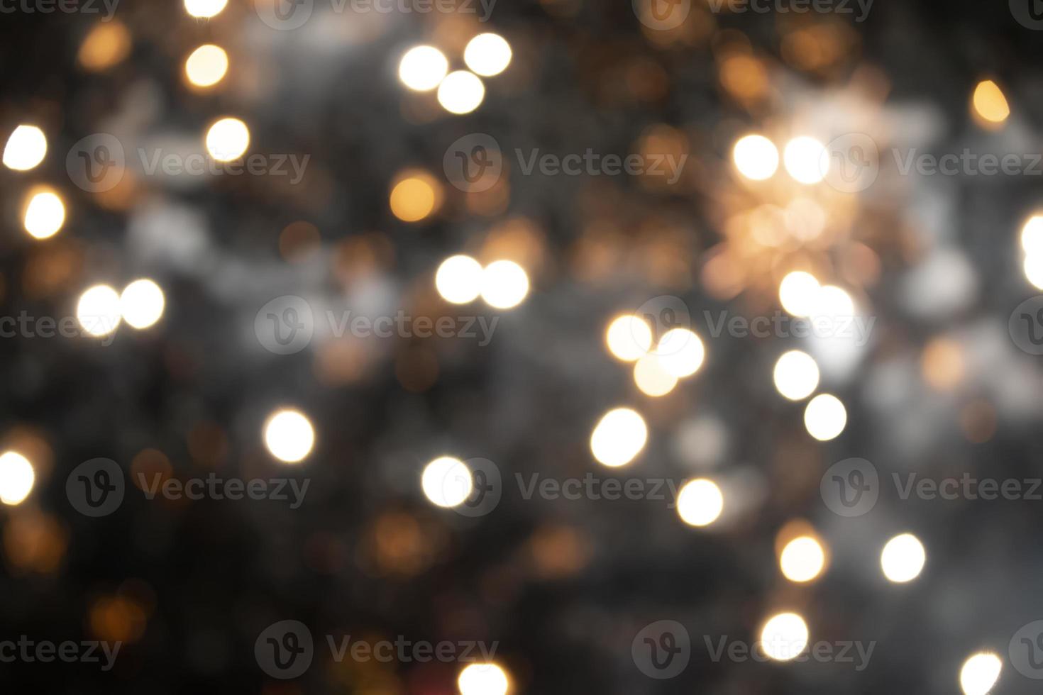 On a black background bokeh from explosions of colorful fireworks. photo