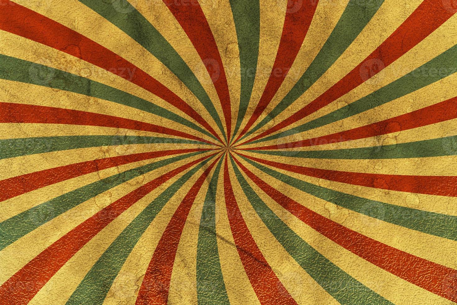 Vintage paper background with rays or stripes in the center. Solar multi-colored rays with spots. Circus poster. photo