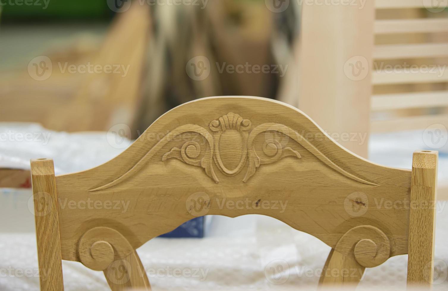 Furniture production from a natural tree. Production of chairs at the factory. photo