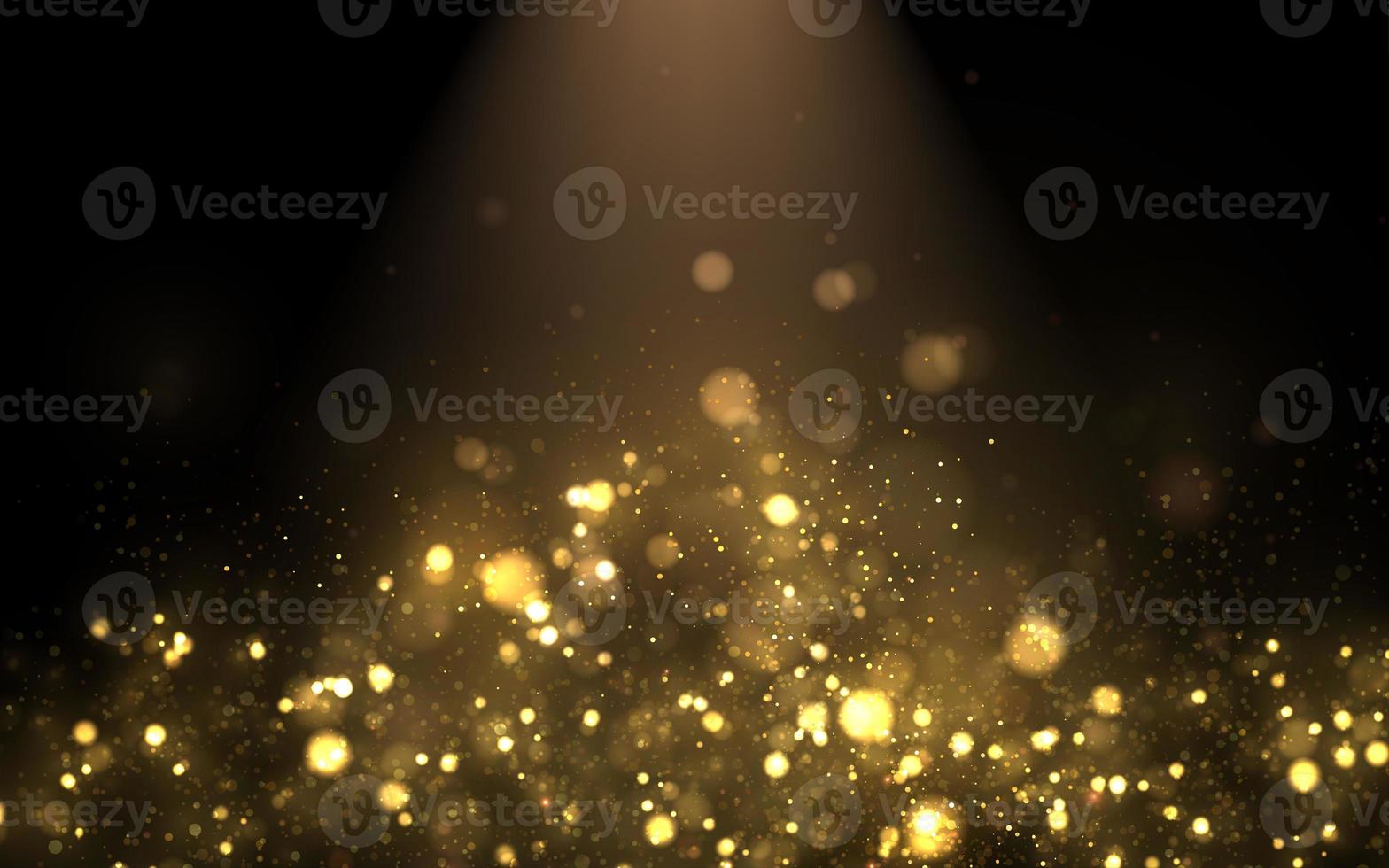 Sparkling dust particles. Glittering golden dust. Abstract background with bokeh effect. photo