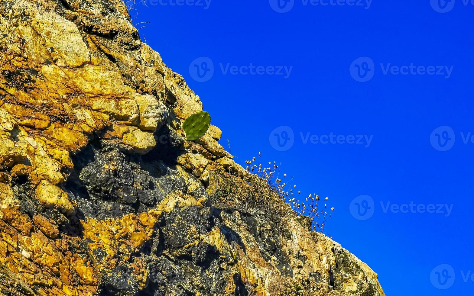 Mountain panorama cliffs rocks hilly tropical landscape Puerto Escondido Mexico. photo