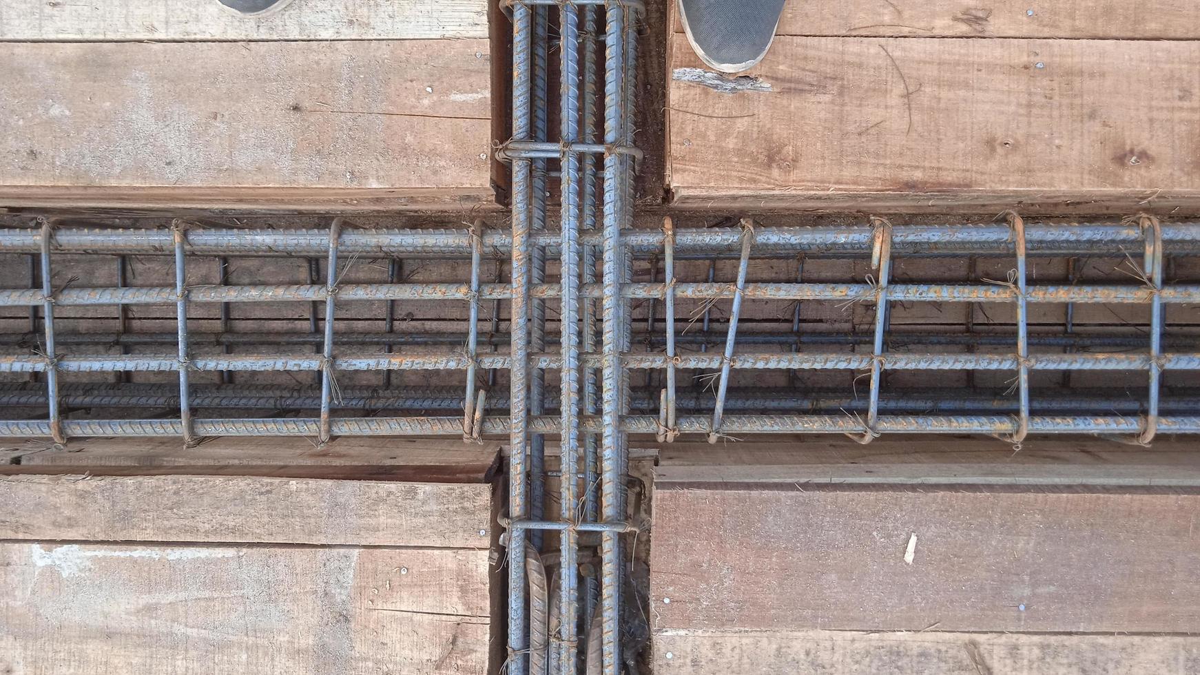 Close up view of reinforcement of concrete Construction rebar steel work reinforcement at a construction site. Steel bar construction for concreting photo