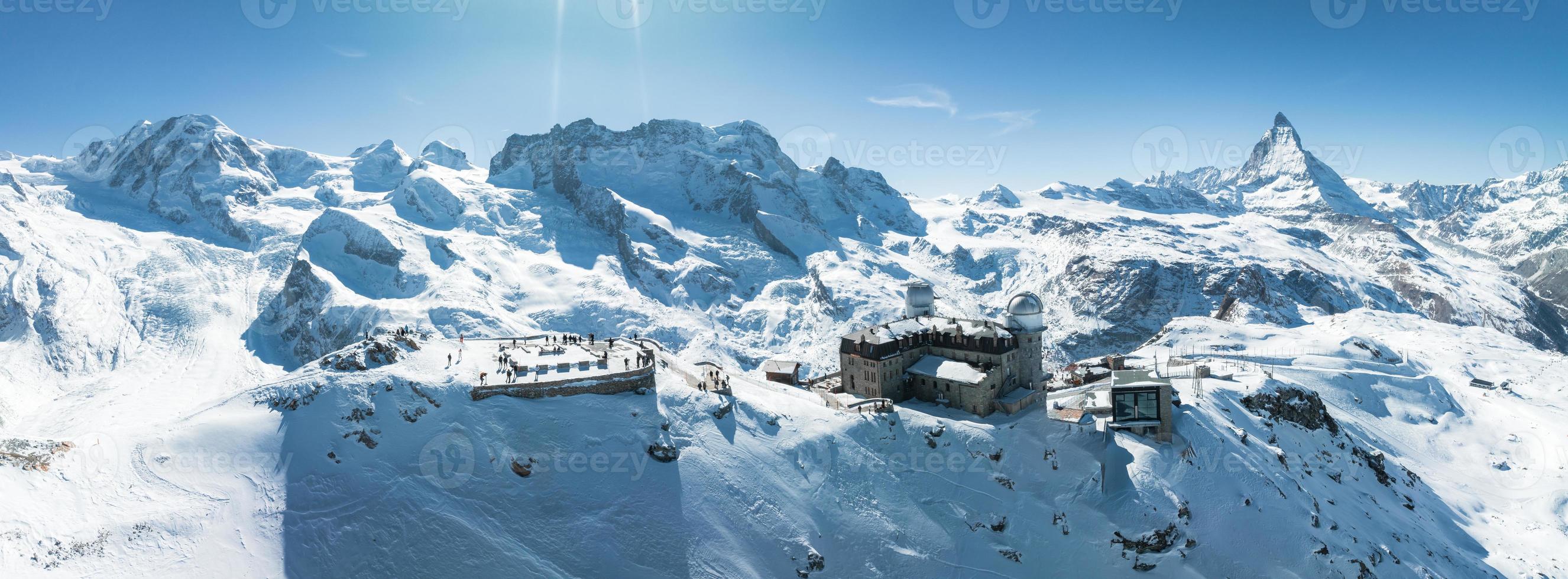 Aerial panorama view of the luxury hotel and the astronomic observatory at the Gornergrat photo