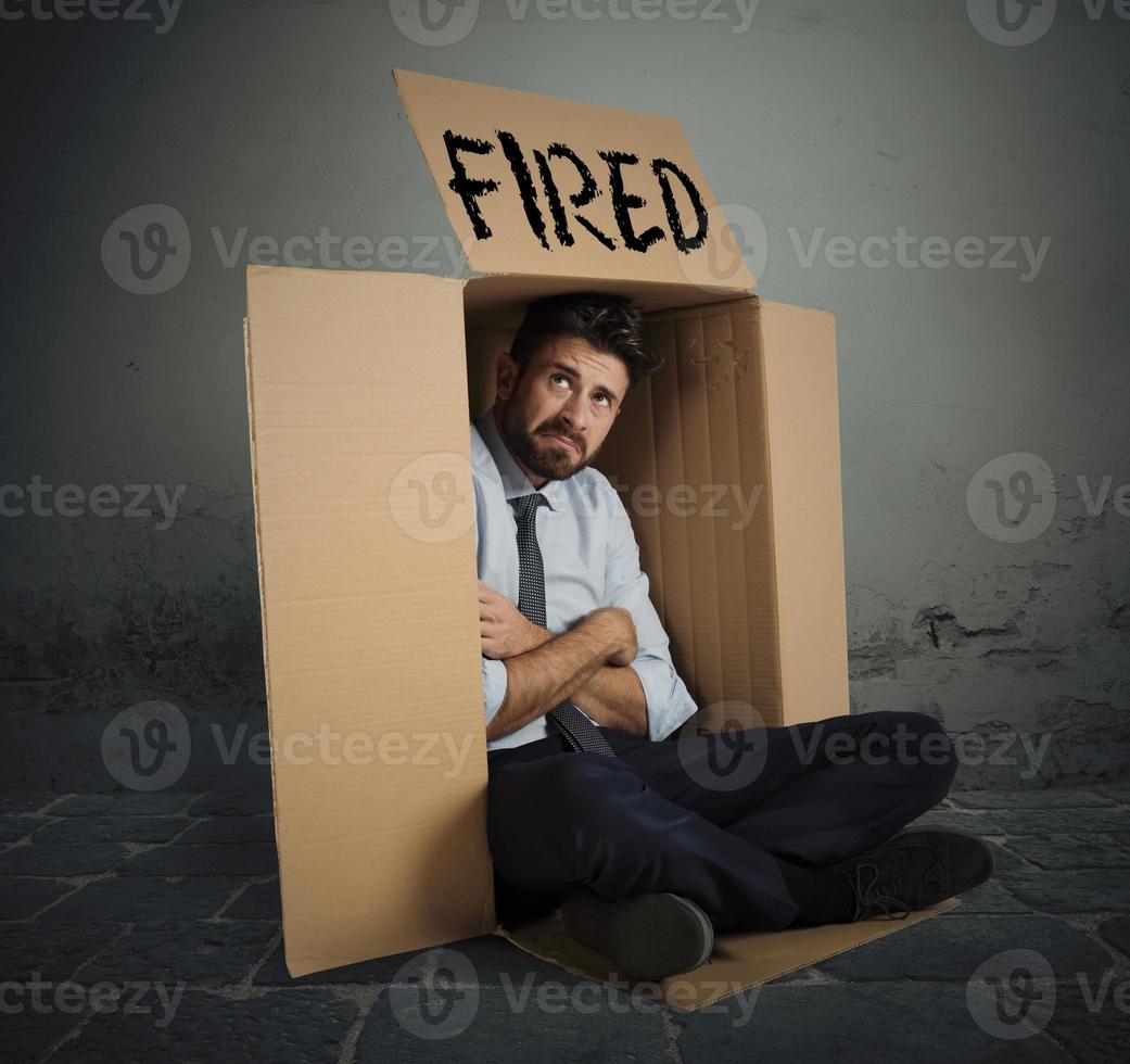 Fired and sad businessman photo