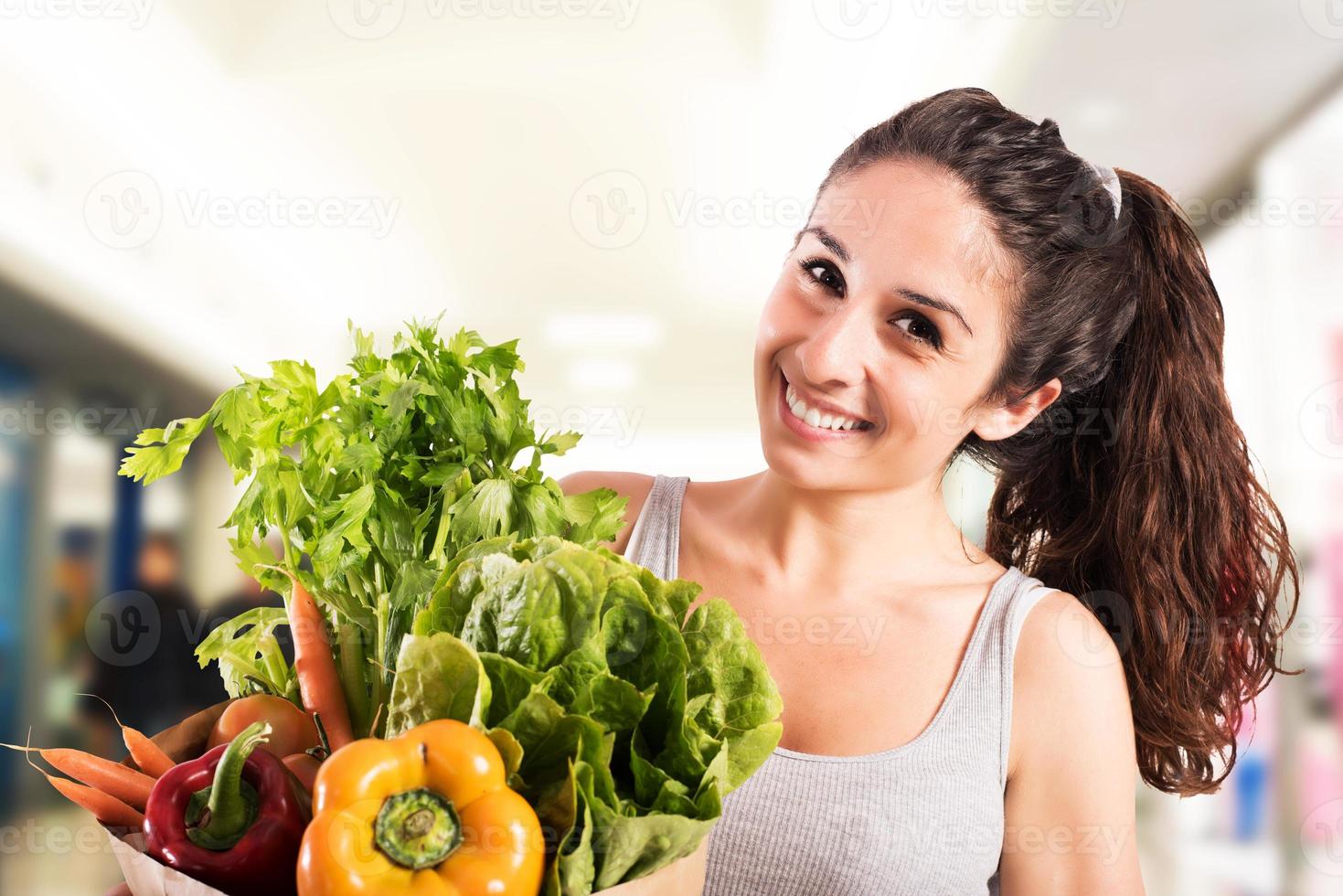 Woman shopping veggies photo