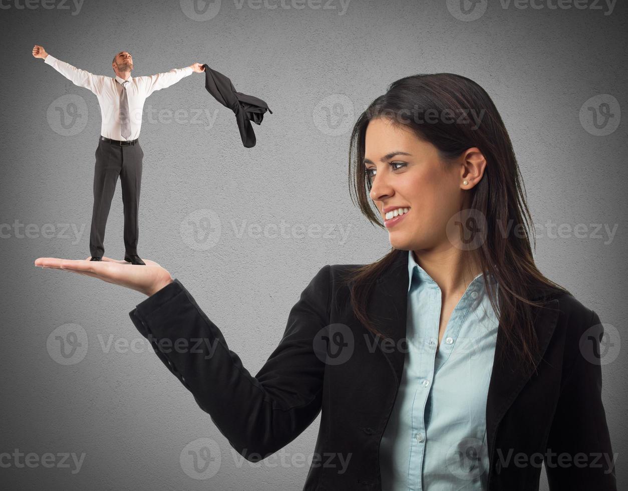 Exultant businesswoman with man photo