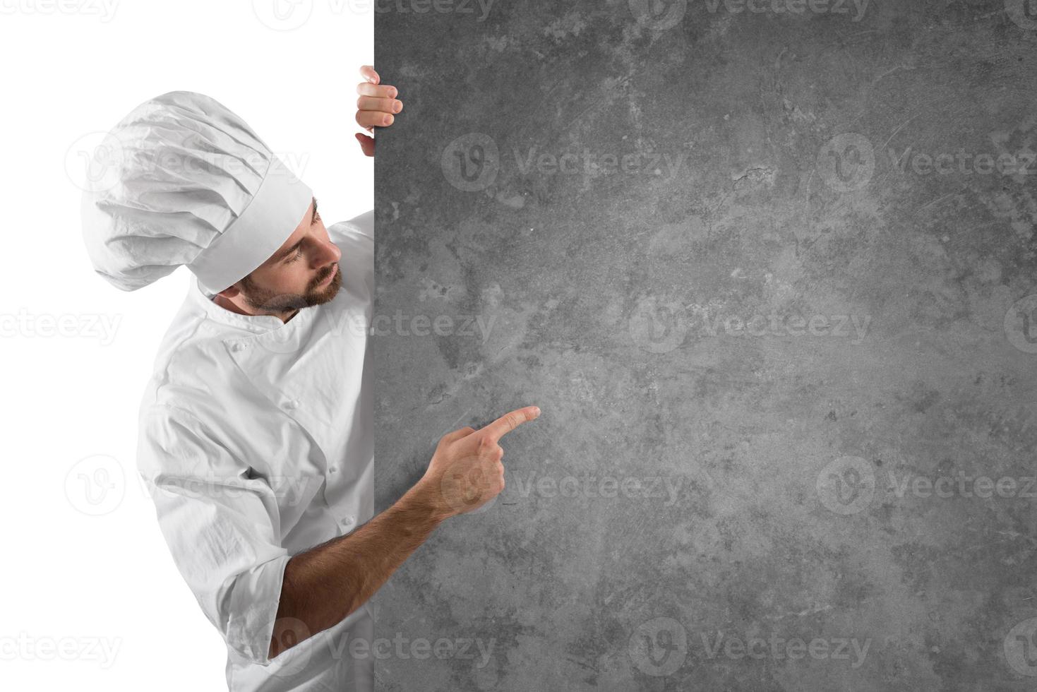 Chef with blank menu photo