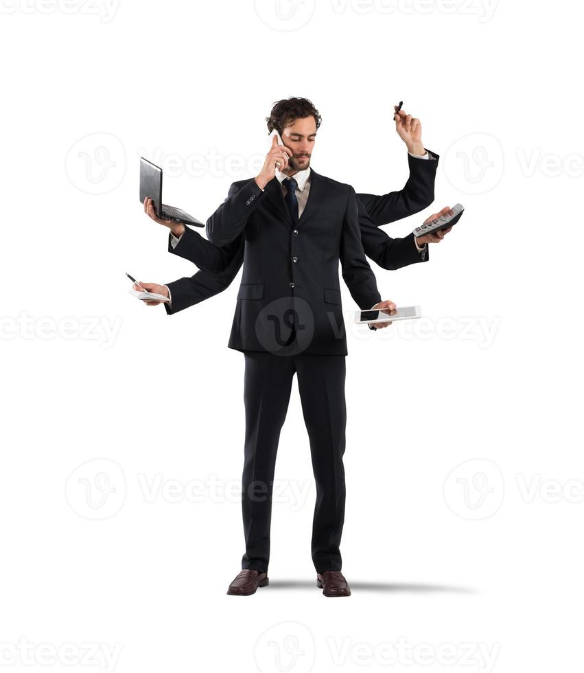 Multitasking businessman on white background photo