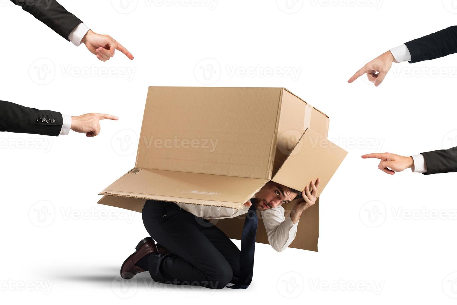 Guilty businessman on white background photo
