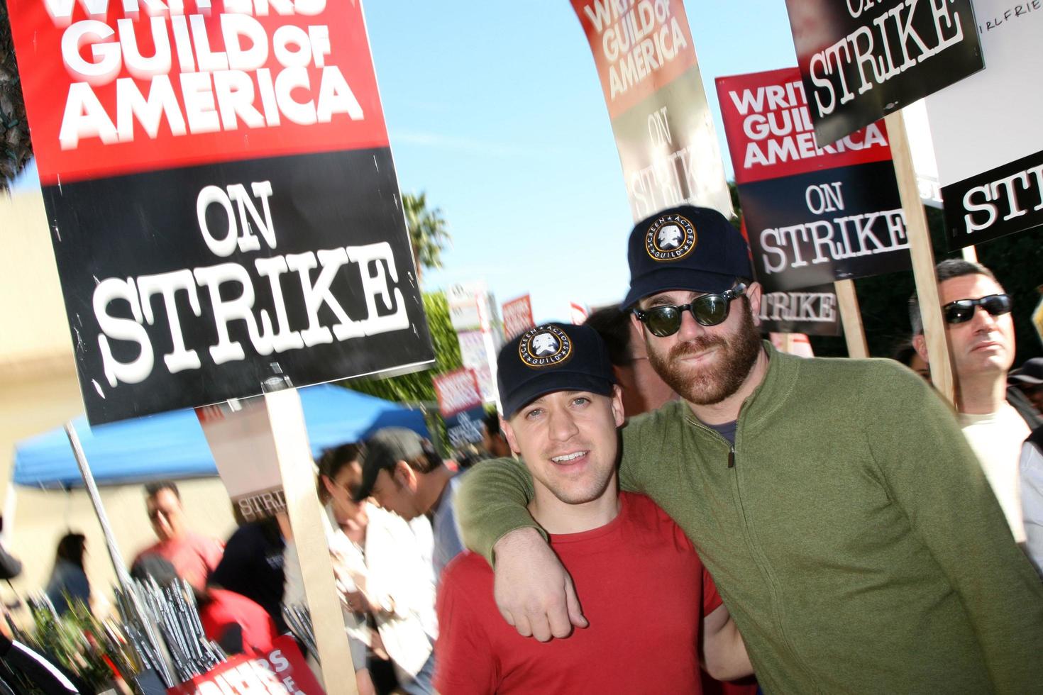 TR Knight  Paul AdelsteinActors Support WGA Strike Paramount StudiosDecember 12 2007Los Angeles CA2007 photo