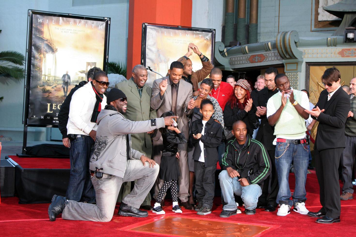 Will Smith with his family  Friends  and Tom CruiseWill Smith Handprint and Footprint Ceremony Graumans Chinese Theater ForecourtDecember 10 2007Los Angeles CA2007 photo