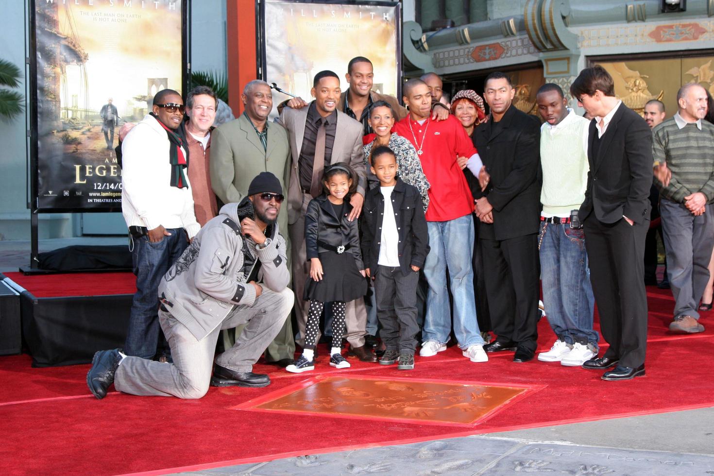 Will Smith with his family  Friends  and Tom CruiseWill Smith Handprint and Footprint Ceremony Graumans Chinese Theater ForecourtDecember 10 2007Los Angeles CA2007 photo