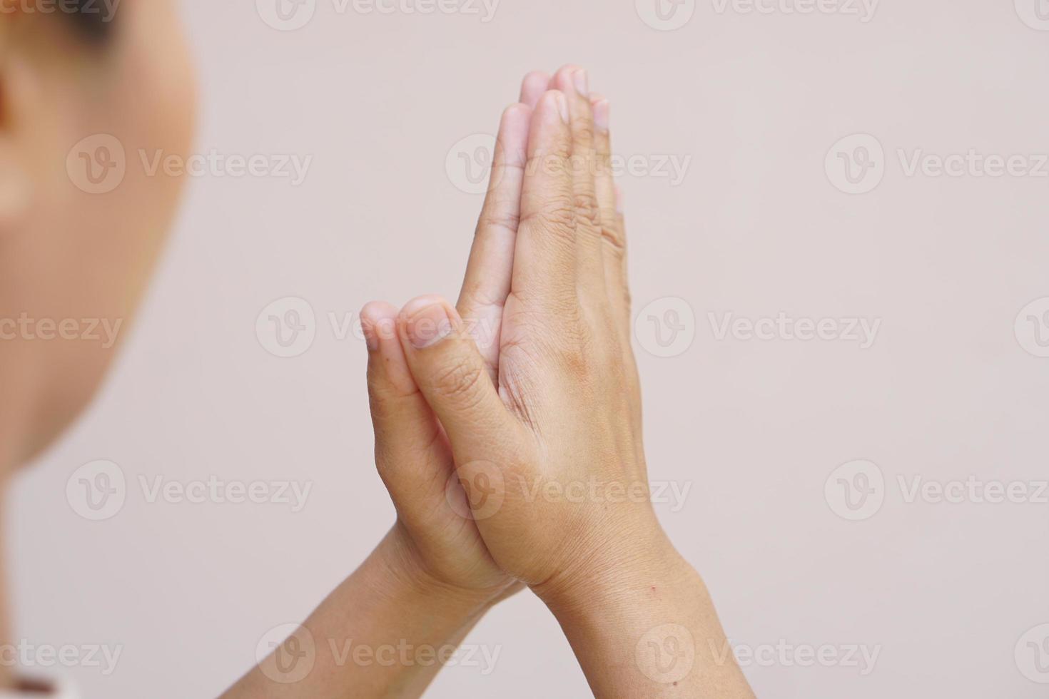 Asian woman praying to God photo