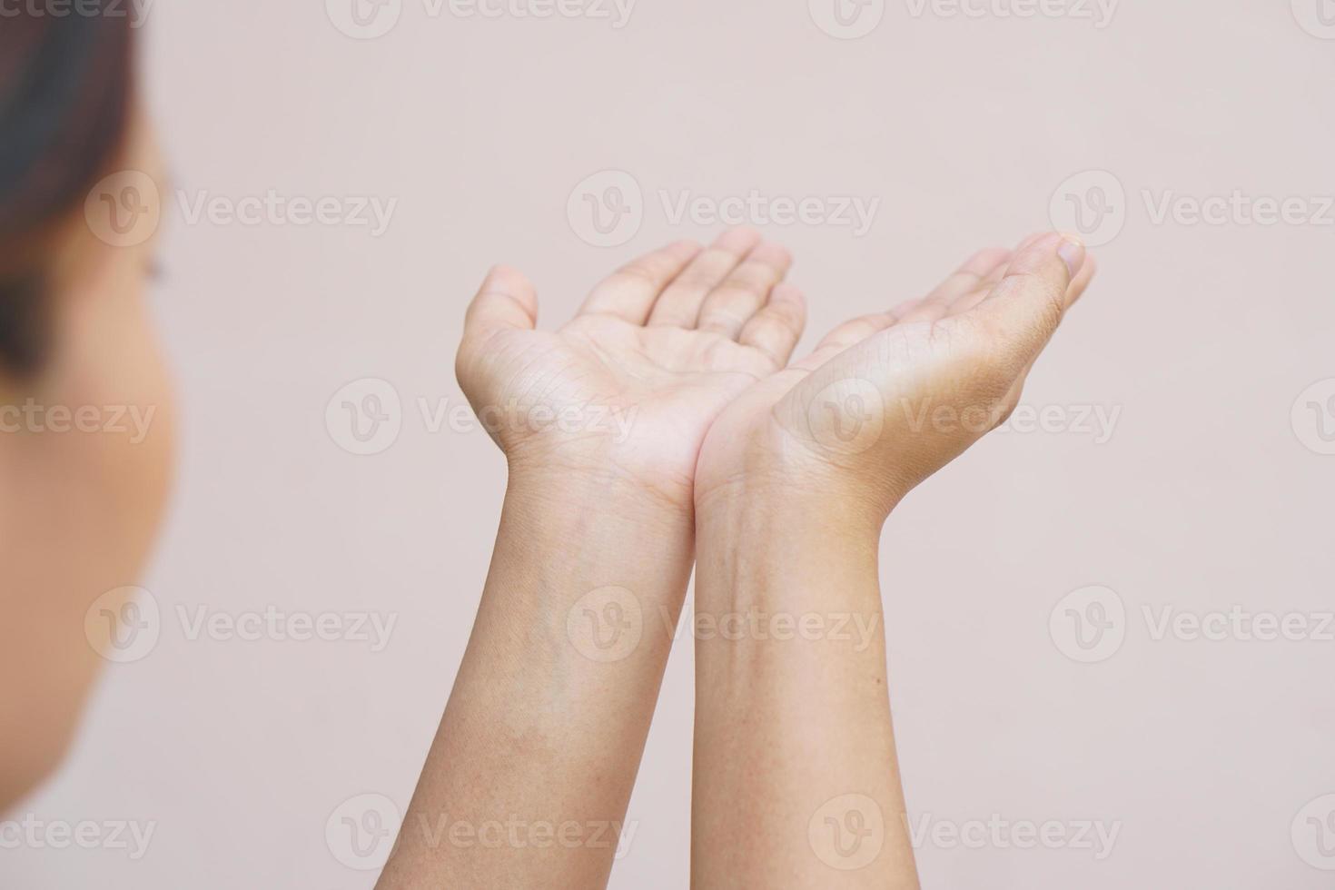 Asian woman praying to God photo