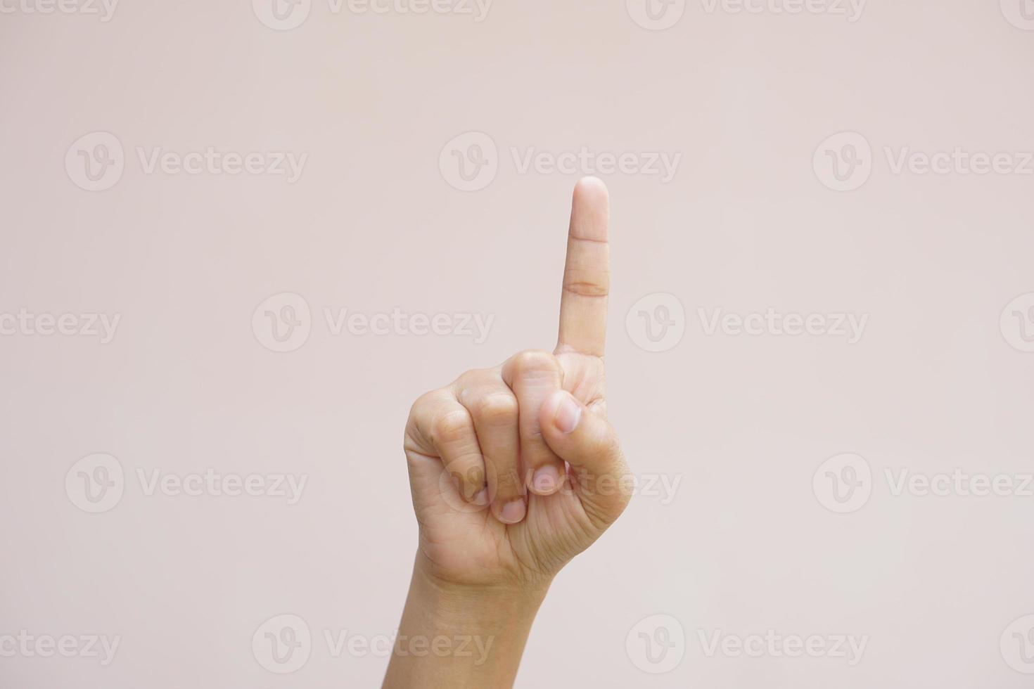 Asian woman making hands like pressing a button photo