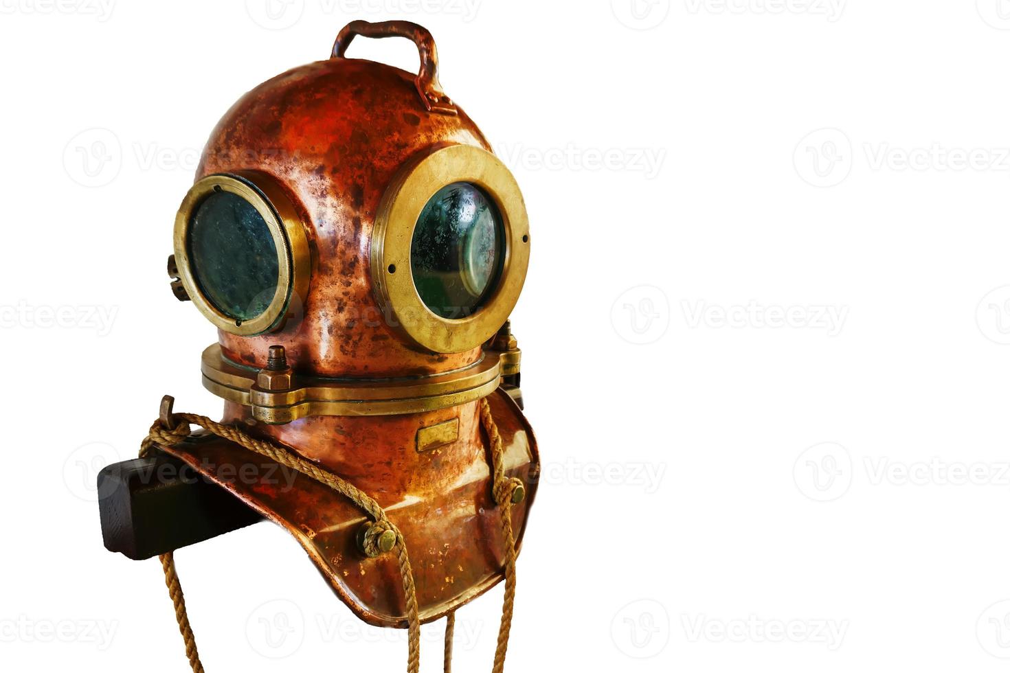 Vintage diving helmet on a white background. photo