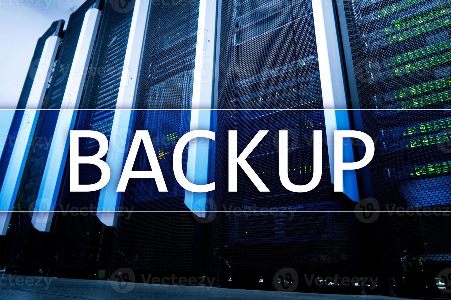 Backup button on modern server room background. Data loss prevention. System recovery. photo