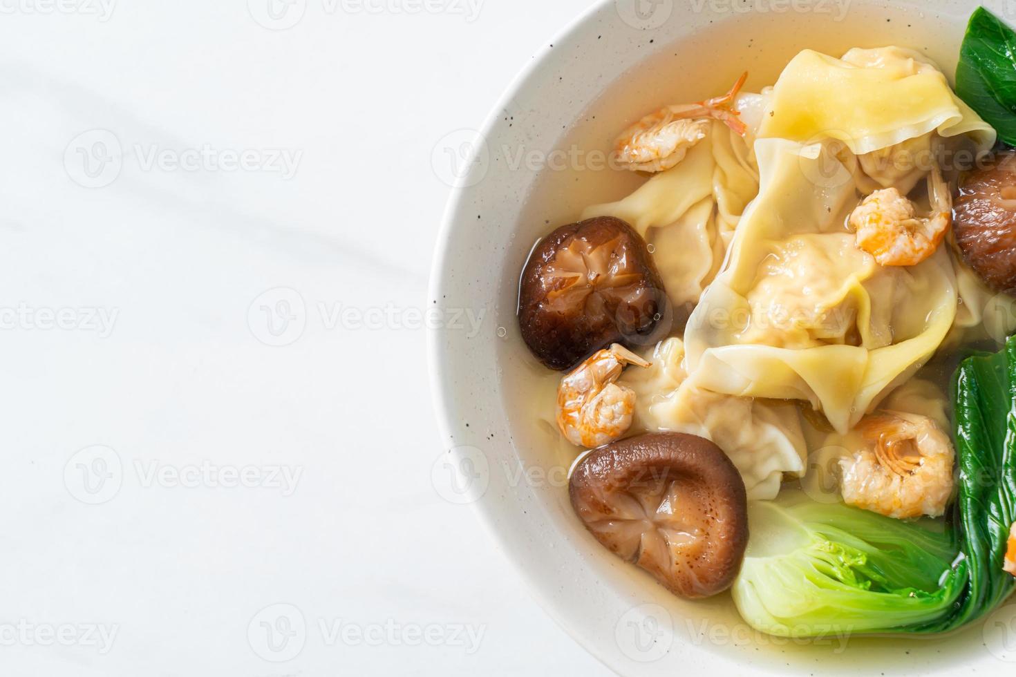 pork dumpling soup with shrimps and vegetable photo