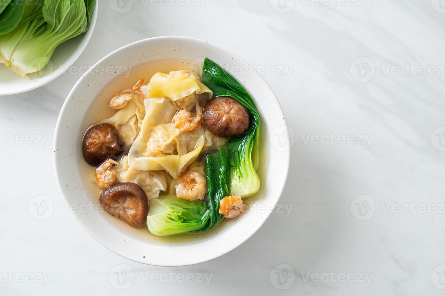 pork dumpling soup with shrimps and vegetable photo