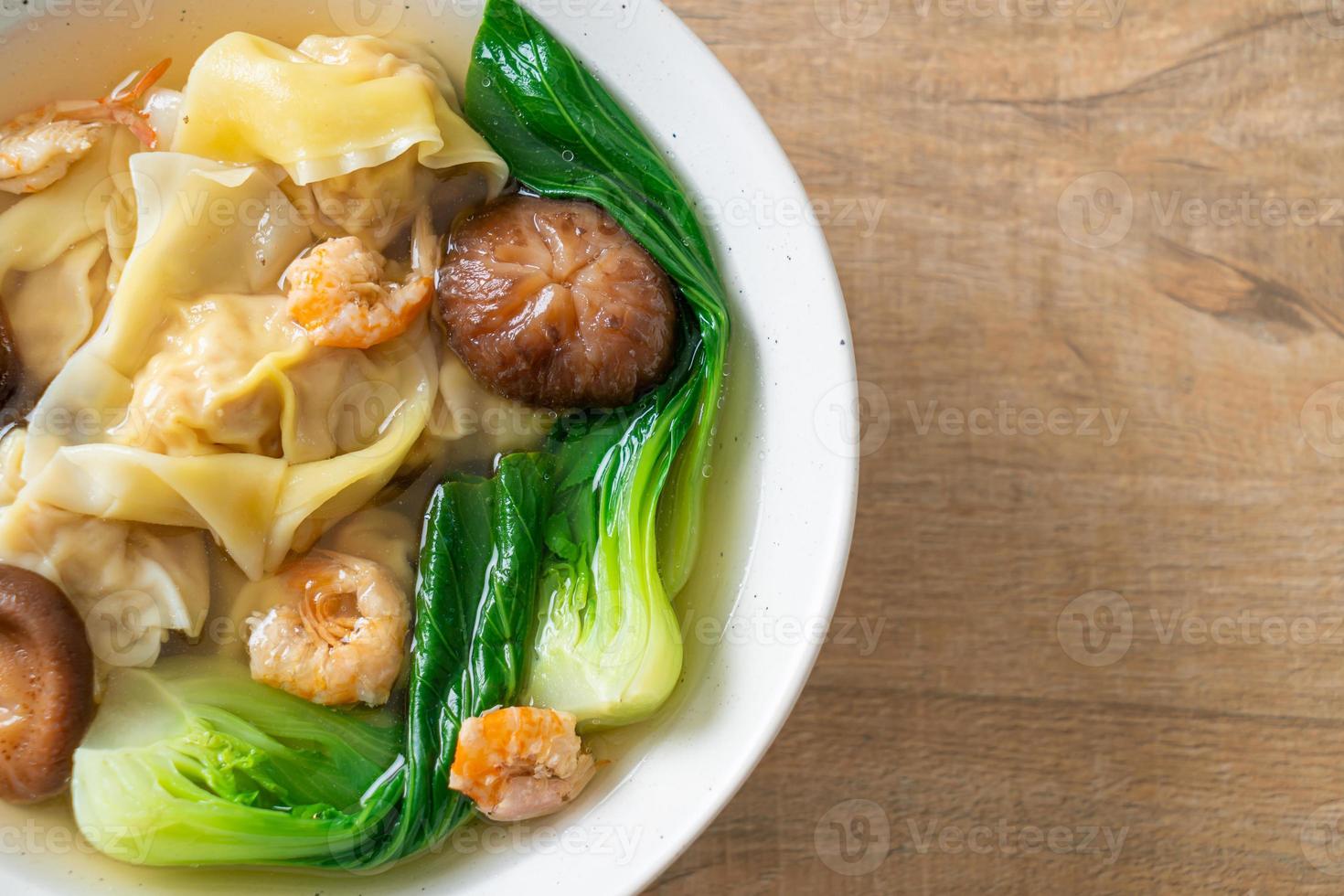 pork dumpling soup with shrimps and vegetable photo