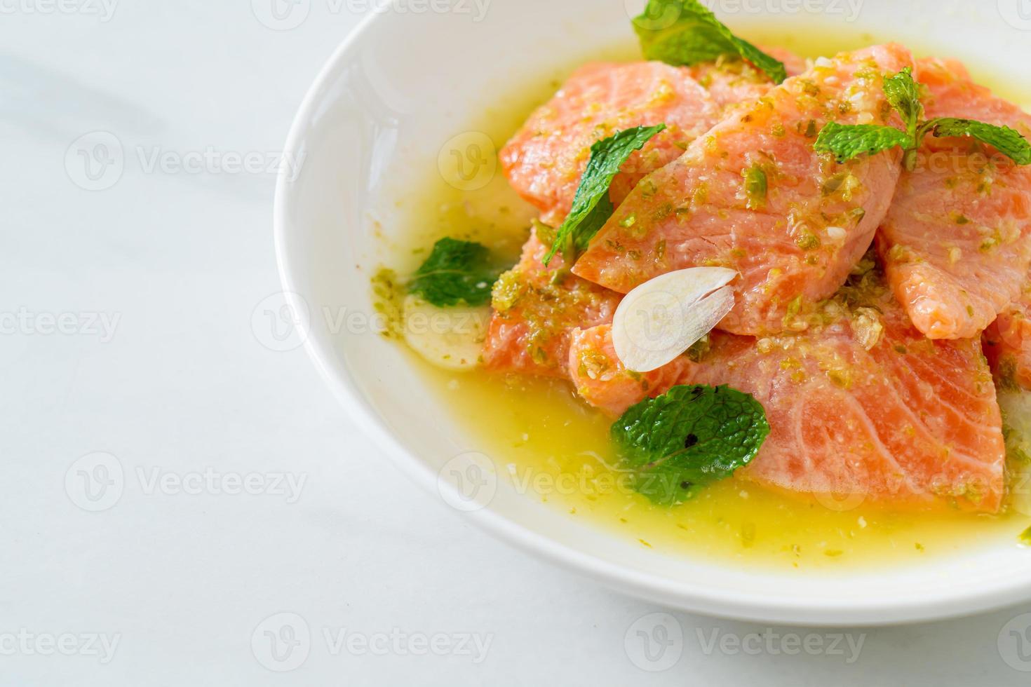 fresh salmon raw spicy seafood salad photo