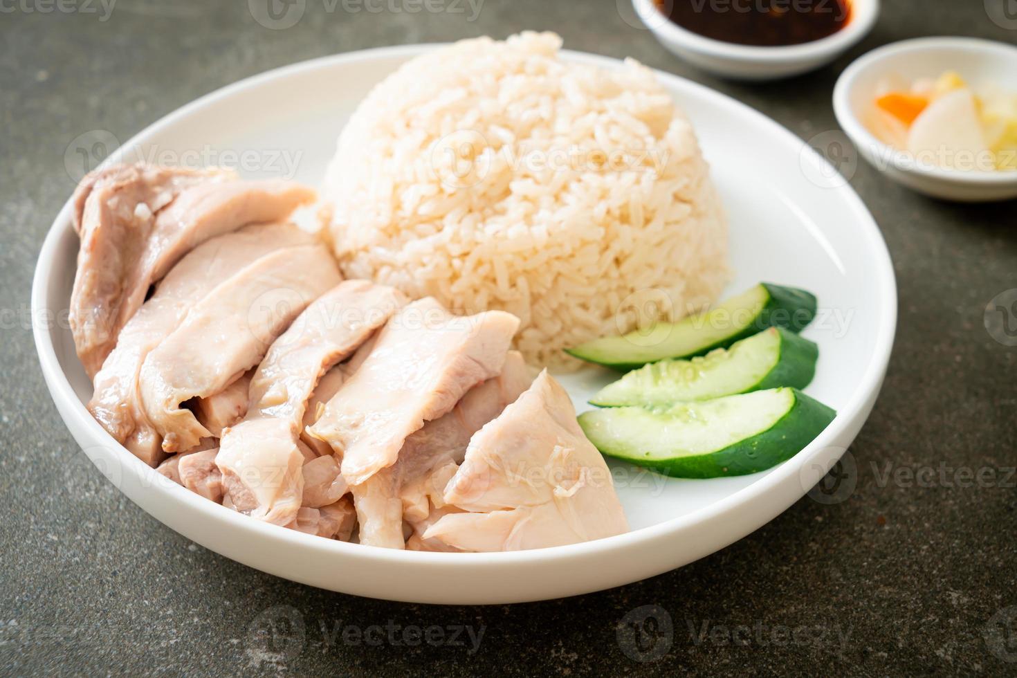 Hainanese chicken rice or rice steamed with chicken soup photo