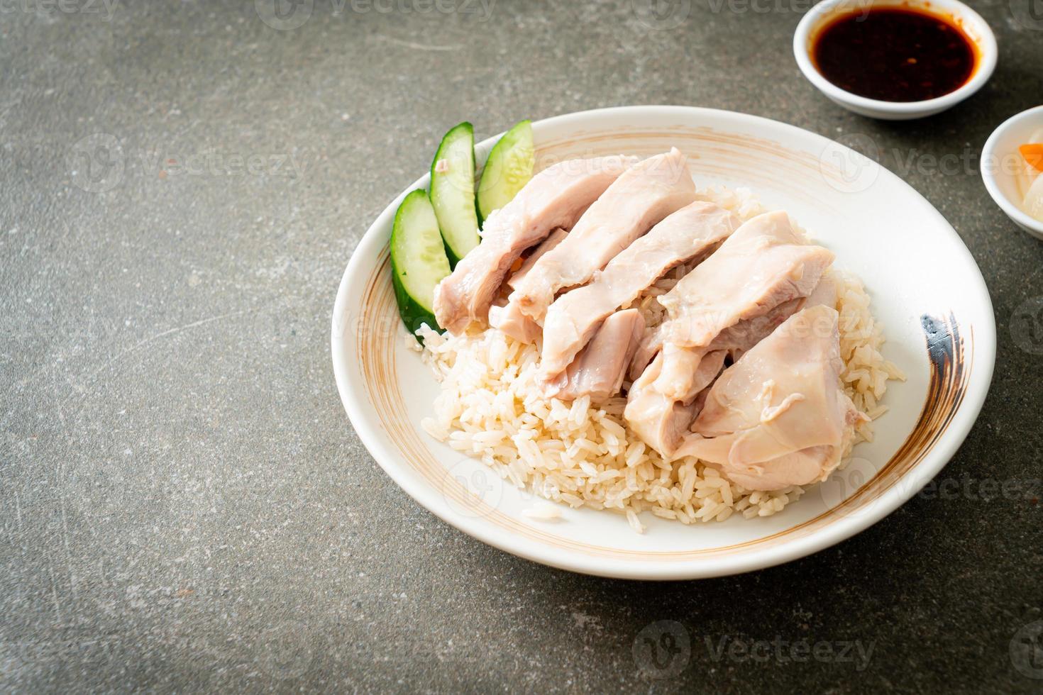 Hainanese chicken rice or rice steamed with chicken soup photo