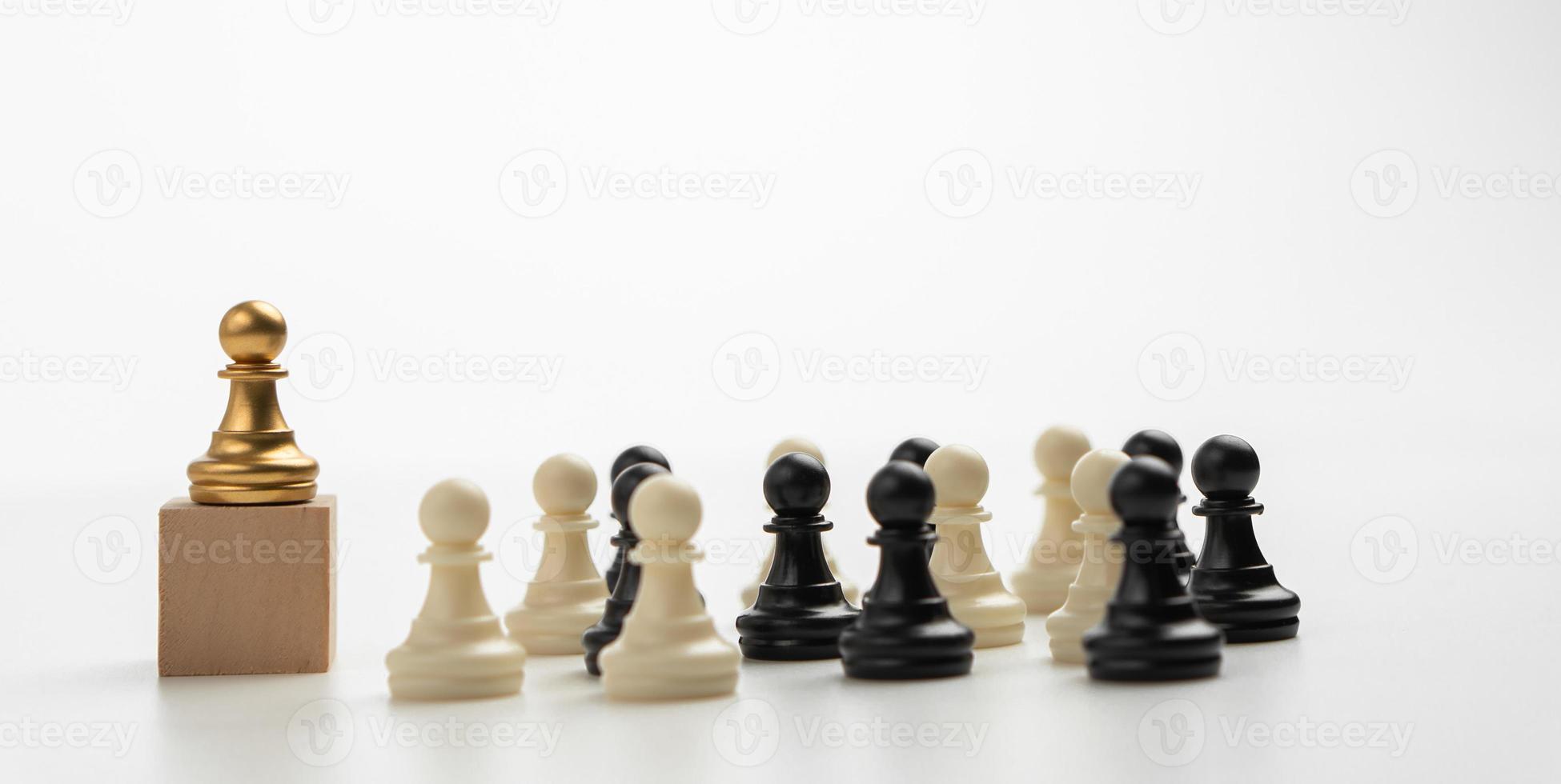 The leadership of the Golden Chess pawn standing on the box show influence and empowerment. Concept of business leadership for leader team, successful competition winner and Leader with strategy photo