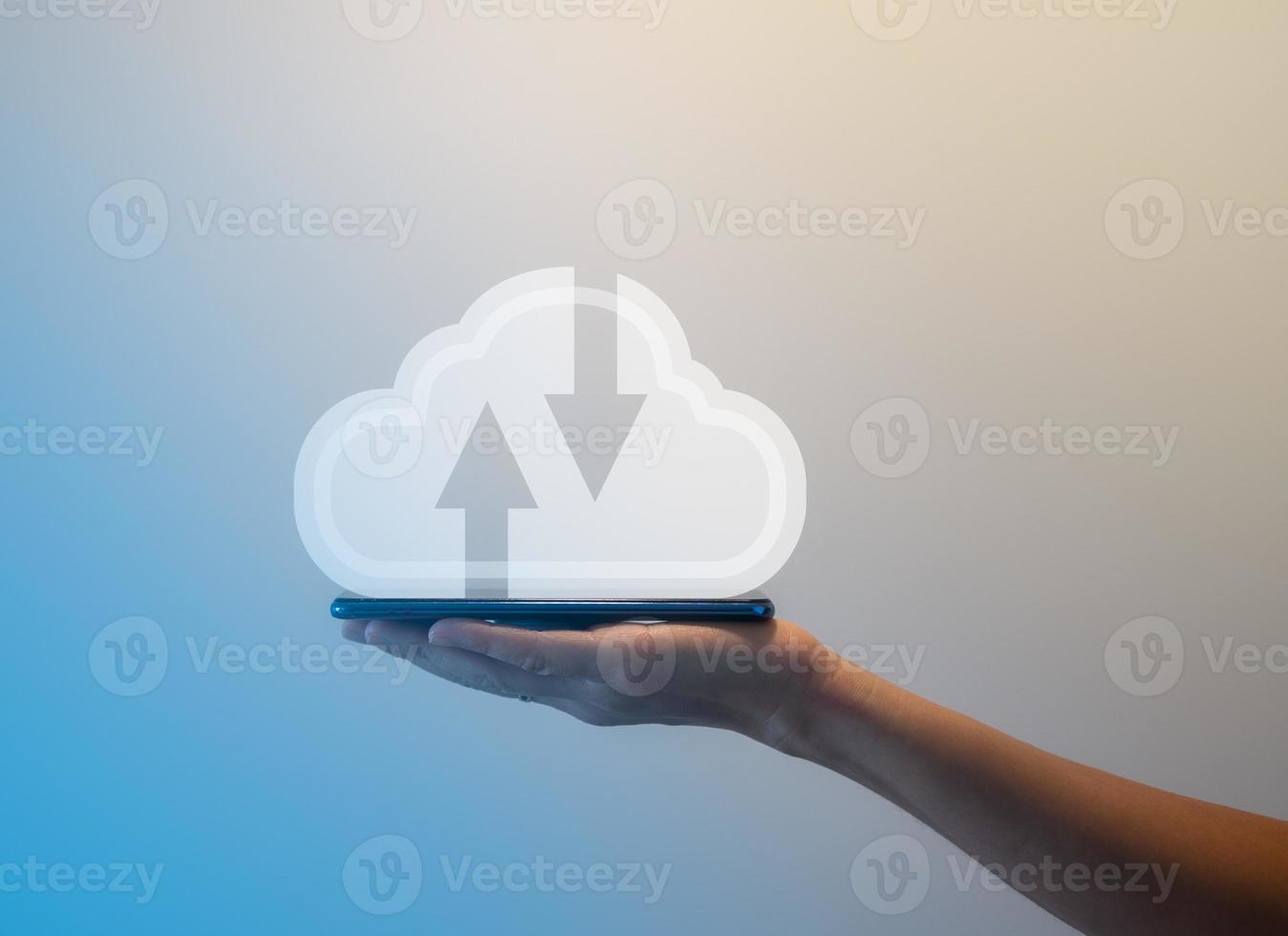 cloud computing concept, hand holding virtual cloud icon, cloud technology big data storage on smartphone photo