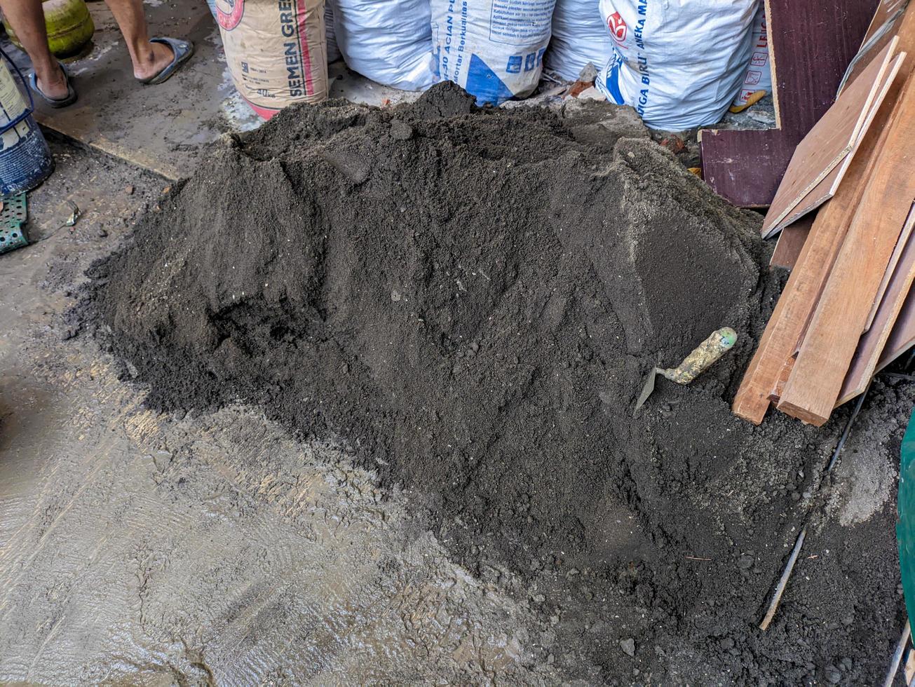 A close up of pile of sands for concrete cement mix or mortar.  For construction background or wallpaper. No people photo