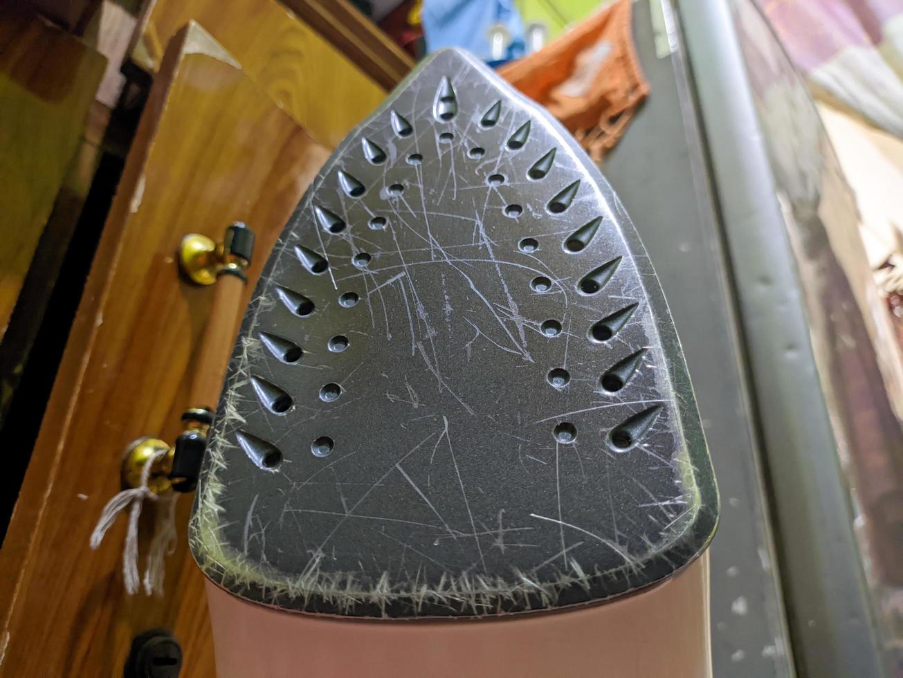 A low angle close up of bottom part of iron photo