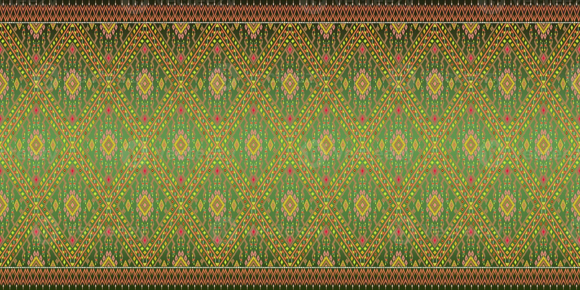 Beautiful colorful Thai knitted embroidery. geometric ethnic oriental pattern traditional on black background, Thai pattern culture, green stylem, clipping path include photo