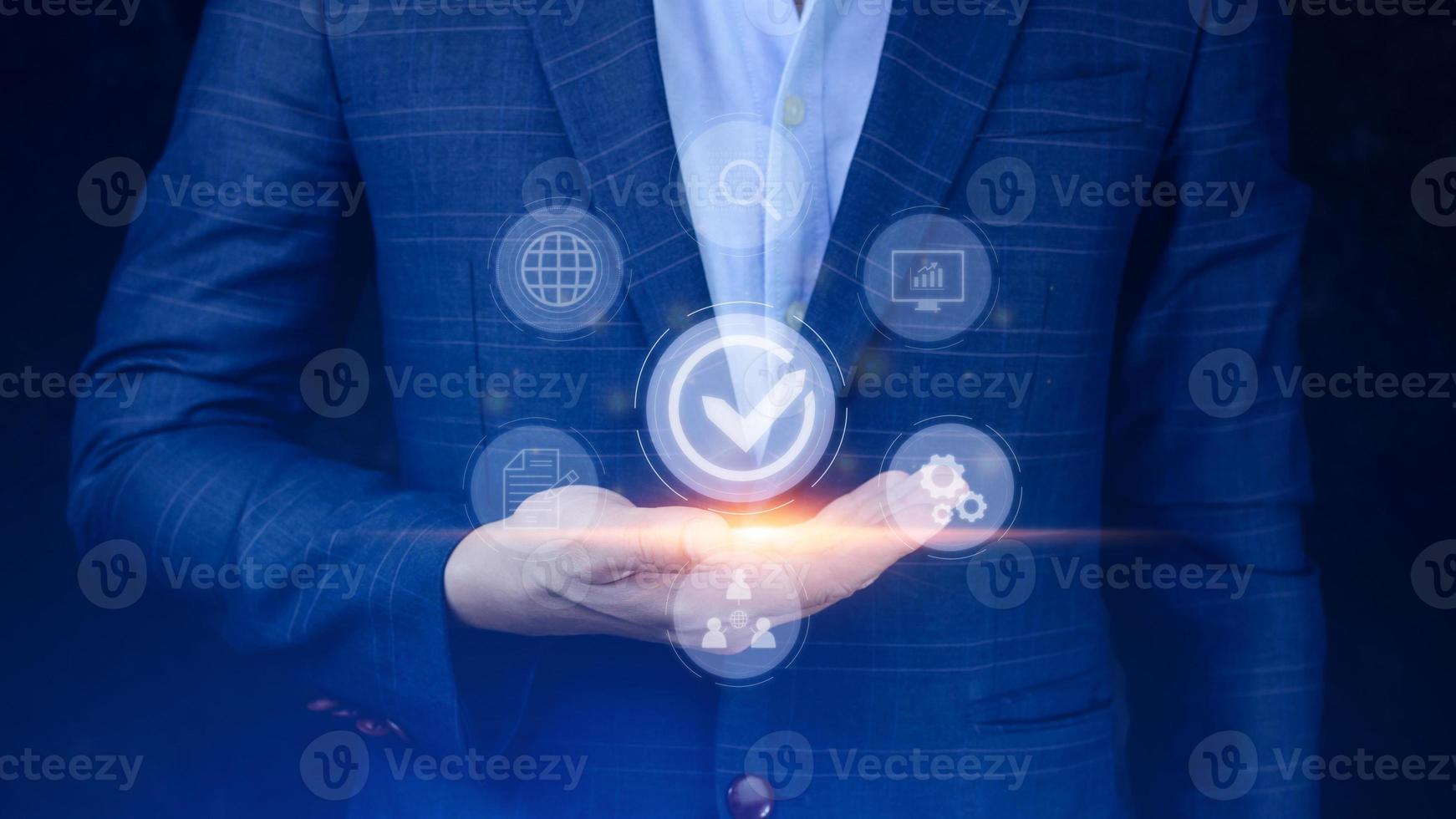 Quality management with Quality assurance or QA and Quality control or QC and improvement. Standardization and certification concept. compliance to regulations and standards. concept with manager. photo