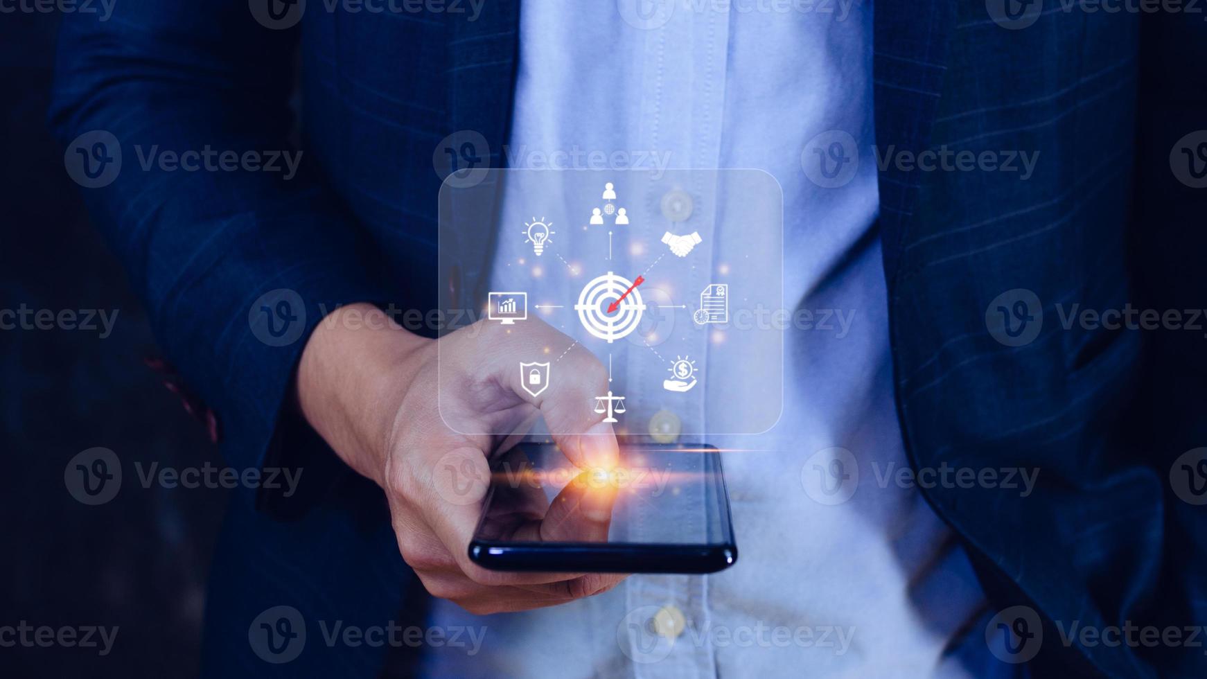 Hand pointing icon virtual screen on smart phone of Digital target marketing advertising and sales increase business technology concept, online marketing, E-business, Ecommerce, Business online. photo