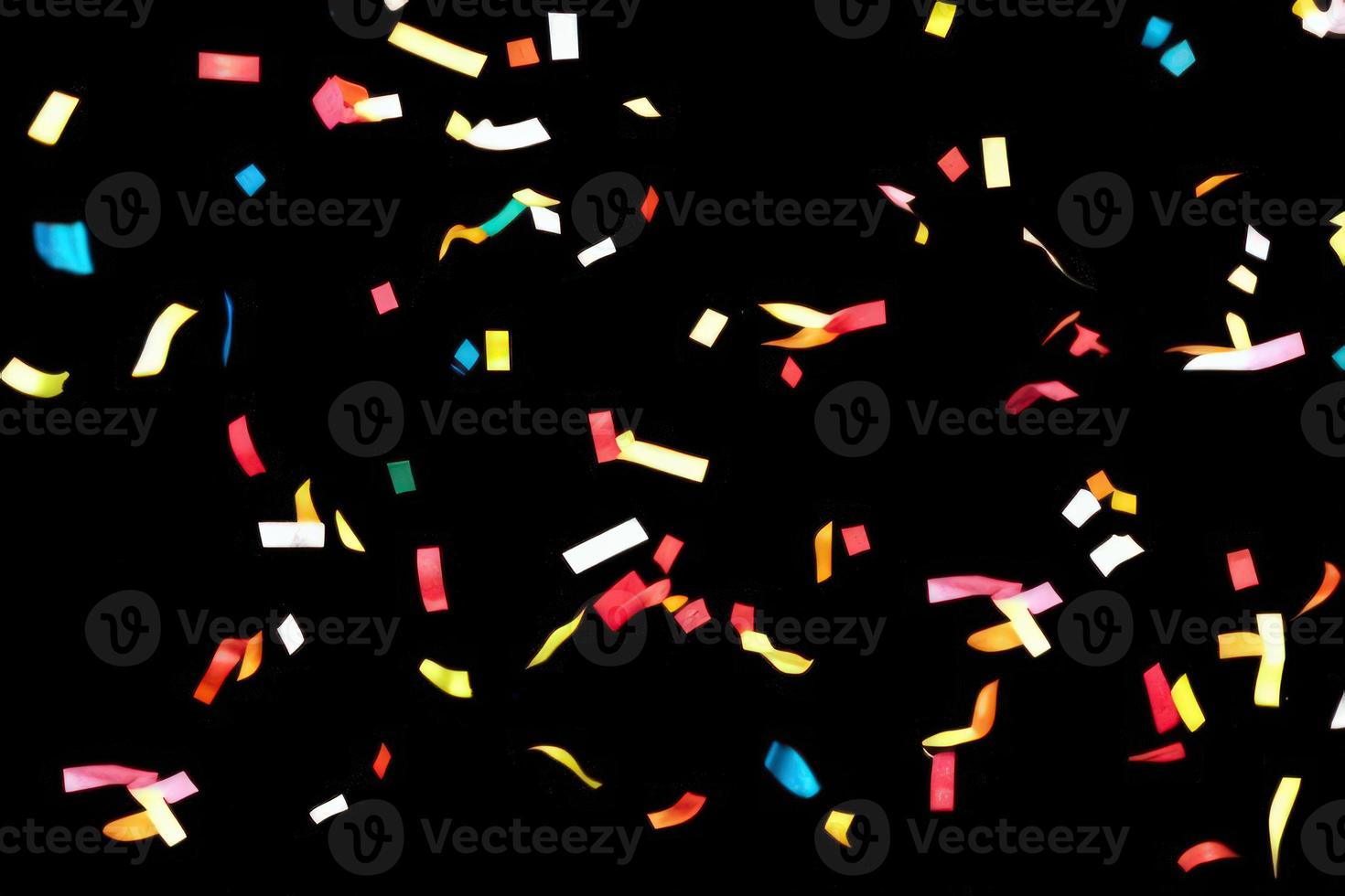 confetti on black background photo