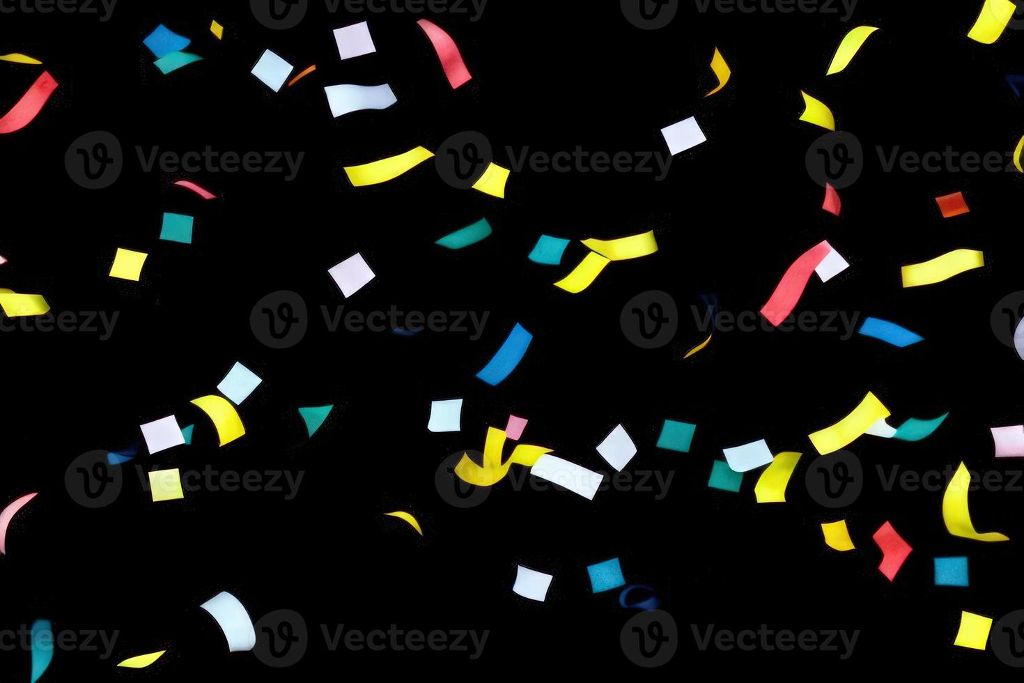 confetti on black background photo