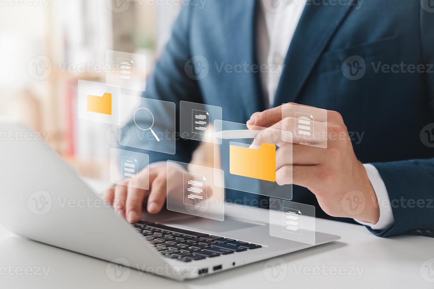 Document management system concept, business man touch folder and document icon software, searching and managing files online document database, for efficient archiving and company data. photo